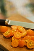 Sliced Kumquats on Cutting Board