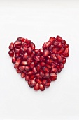 Pomegranate Heart on White Background 
