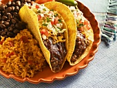 Two Beef Tacos with Rice and Beans