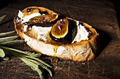 Slice of Bread Topped with Goat Cheese, Honey and Figs