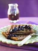 Waffles with Blueberry Sauce on a Plate with Fork