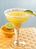 Orange Lime Margarita in Glass with Salted Rim
