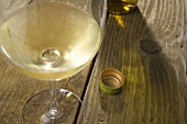 Glass of White Wine on a Rustic Wooden Table