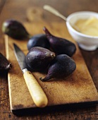 Organic Figs on a Cutting Board with Knife