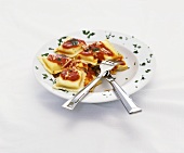Plate of Cheese Raviolis with Tomato Sauce