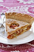 Piece of Tomato Pie on a White Plate; Fork