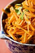 Bowl of Shredded Carrot; Close Up