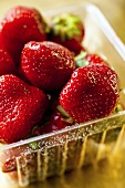 Fresh strawberries in plastic punnet