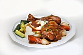 Coq au Vin with Mashed Potatoes; On a White Plate