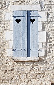 Wooden Shutters with Hearts Cut Out; French Countryside