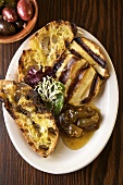 Grilled Scamorza Cheese with Rustic Bread, Green Tomato Preserve and Olives