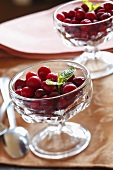 Glass Bowls of Cranberry Salad with Mint Garnish