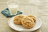 Three Snickerdoodles on a Plate with a Glass of Milk