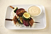 Sausage Zucchini and Onion Kabobs Over White Rice; Dipping Sauce