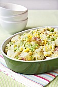 Potato Salad in a Serving Dish; Stacked Bowls