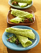 Spinach Crepes on Three Assorted Plates