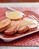 Schweinekoteletts mit Sauce