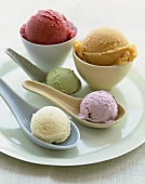 Five Assorted Scoops of Sorbets and Ice Cream; On Spoons and In Bowls