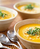 Three Bowls of Pumpkin Soup; Spoons