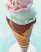 Waffle Cone with Three Scoops of Assorted Ice Cream Topped with Sprinkles