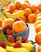 Colorful Fresh Fruit; Bananas, Strawberries and Oranges
