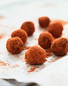 Homemade chocolate truffles dusted with cocoa powder