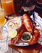 A whole lobster with pesto and New England clam chowder (USA)