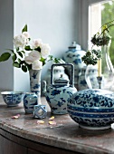 Blue and white Chinese tea porcelain on a window sill