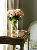 A bunch of roses on a marble table