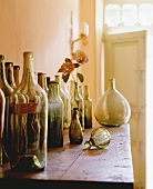 Empty wine bottles on a wooden tables