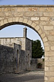 View through an old brick archway of an Italian church