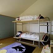A lightweight bunk bed under a slopping roof