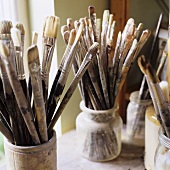 Artists brushes in glasses