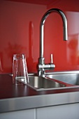 Stainless steel kitchen sink and chrome tap fitting