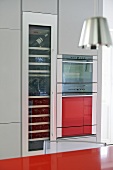 Integral oven and wine cooler in modern kitchen