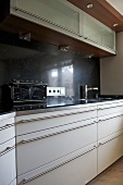 Modern kitchen with white fitted units