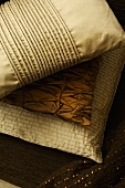 Cushions in covered in elegant shiny fabric