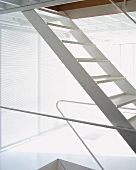 Detail of a white-painted metal ladder