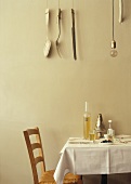 A table laid for two in a kitchen