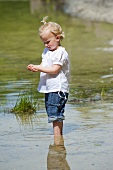 A little girl in a lake