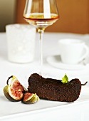 A piece of chocolate cake with fig