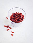 Goji berries in glass with glass spoon