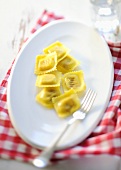 Ravioli on plate with fork