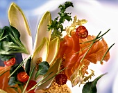 Salad ingredients: chicory, cherry tomatoes, smoked salmon, lamb's lettuce