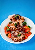 Grilled octopus with tomatoes