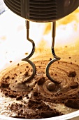 Stirring cocoa powder into a batter
