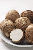 Taro roots, whole and sliced