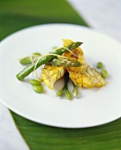 Curried cod with green asparagus