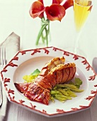 Grilled lobster tail on salad