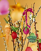 Coloured Easter eggs hanging on pussy willow